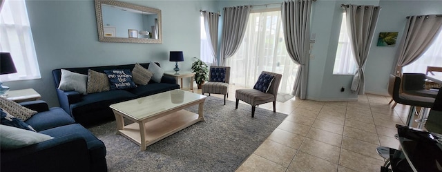 living room featuring light tile patterned flooring