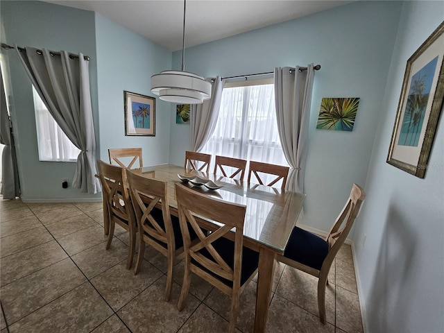 dining area featuring tile patterned floors