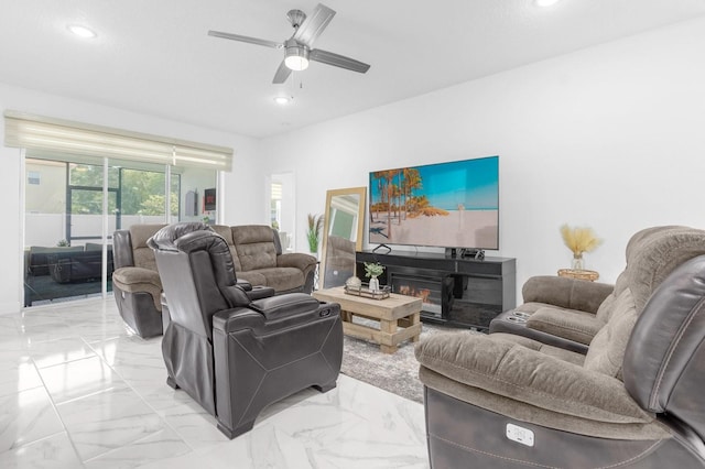 living room featuring ceiling fan