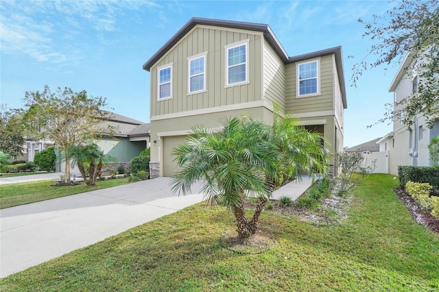 view of front of house featuring a front lawn and a garage