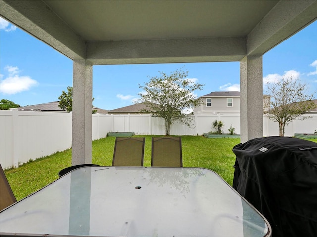 view of patio with a grill