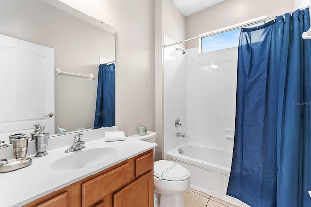 full bathroom with tile patterned floors, shower / bath combination with curtain, toilet, and vanity