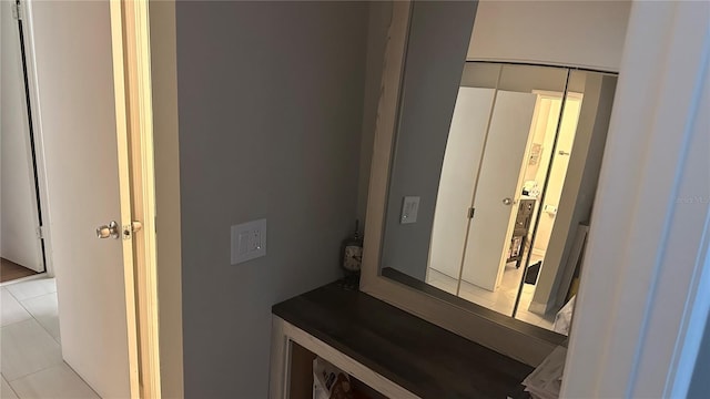 bathroom with tile patterned floors