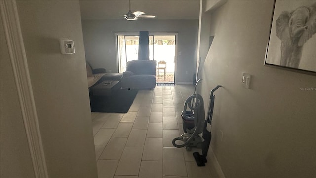 hall with light tile patterned flooring