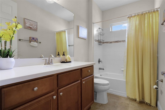 full bathroom featuring toilet, tile patterned floors, vanity, and shower / tub combo with curtain