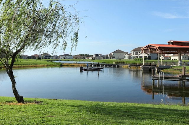 property view of water featuring a boat dock