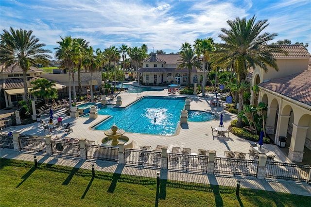 view of pool featuring a patio area