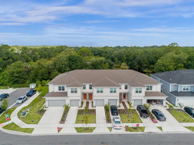 exterior space with a forest view