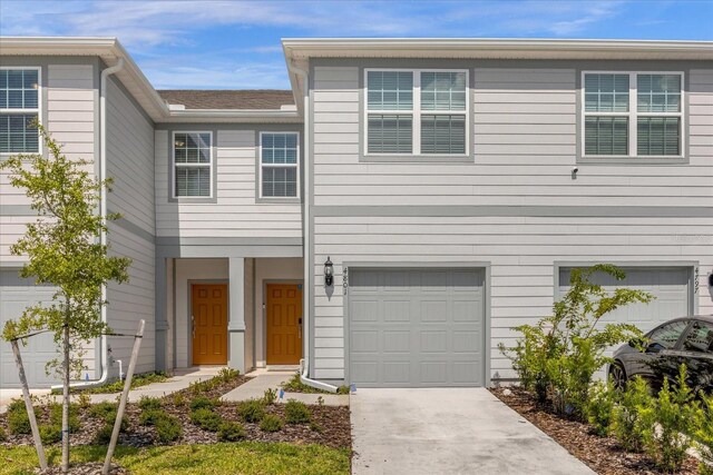 view of property with a garage