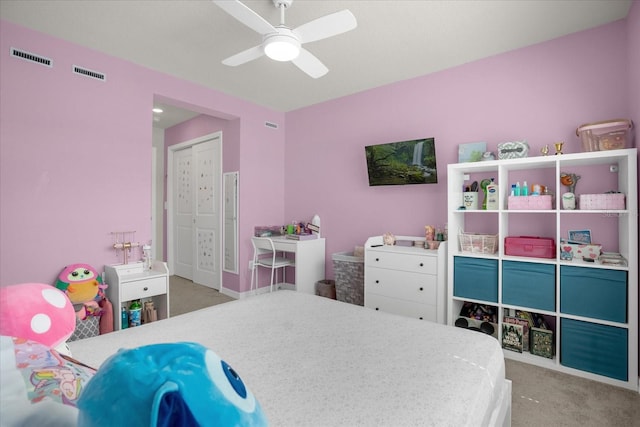 bedroom featuring carpet, a closet, visible vents, and ceiling fan