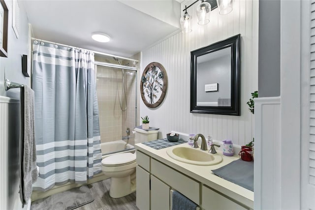 full bathroom with vanity, wood-type flooring, shower / bath combo, and toilet