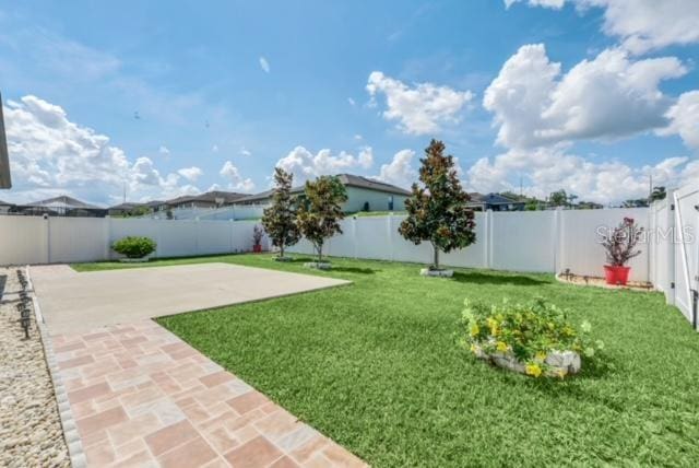 view of yard with a patio