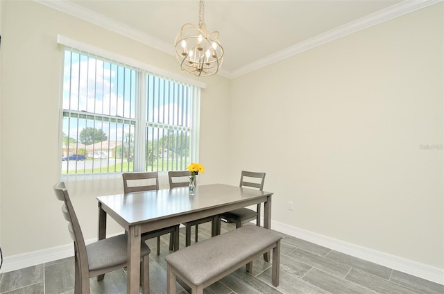 dining space with a chandelier, wood-type flooring, and ornamental molding