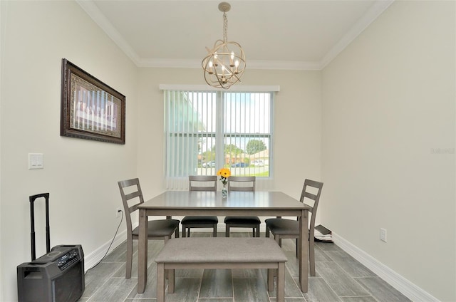 dining area with a chandelier, hardwood / wood-style floors, and ornamental molding