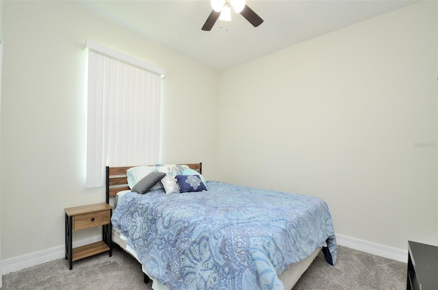 bedroom with light colored carpet and ceiling fan