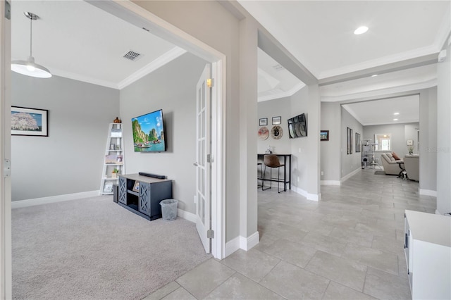 corridor with light carpet and crown molding