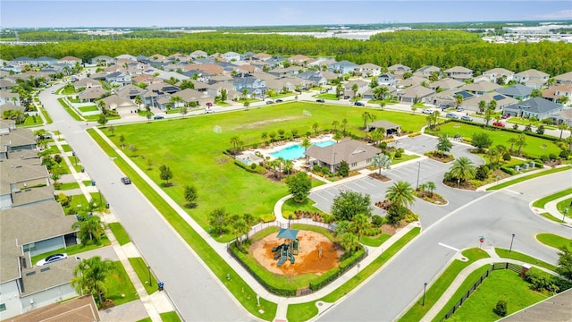 12151 Alder Branch Loop, Orlando, FL 32824 - aerial perspective of suburban area featuring a pool