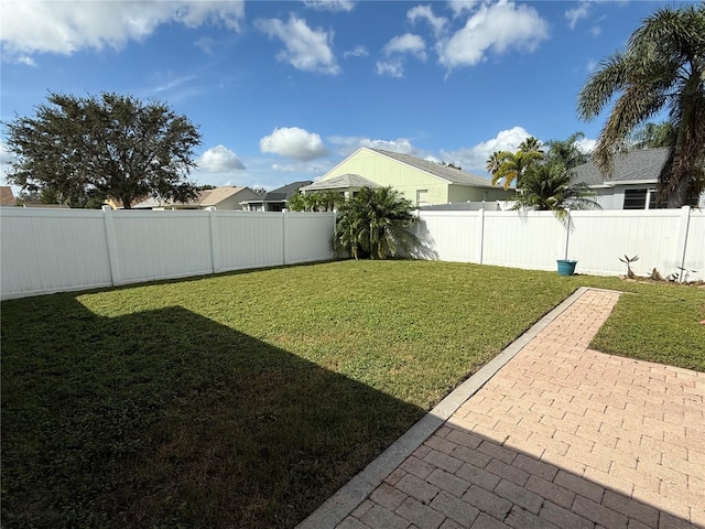 view of yard with a patio area