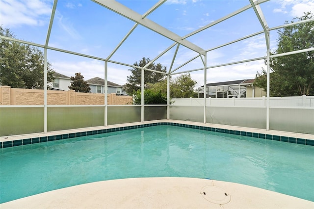 view of pool with a lanai