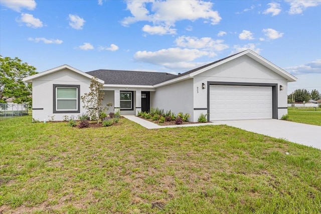 ranch-style home featuring a front yard and a garage