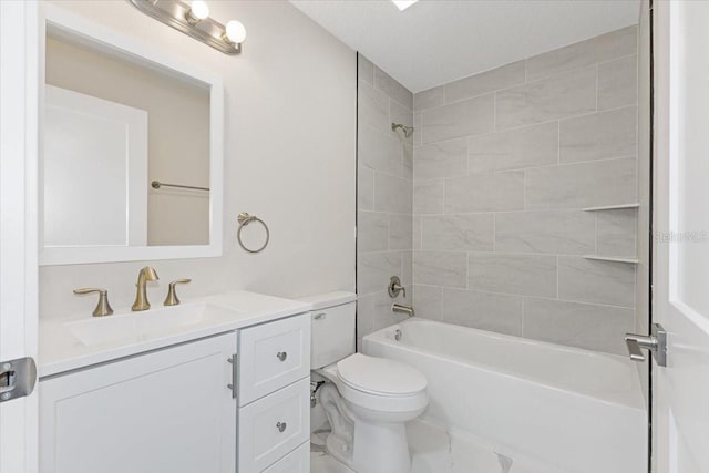 full bathroom with toilet, tiled shower / bath combo, and vanity