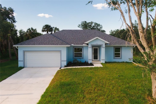 single story home with a garage and a front lawn