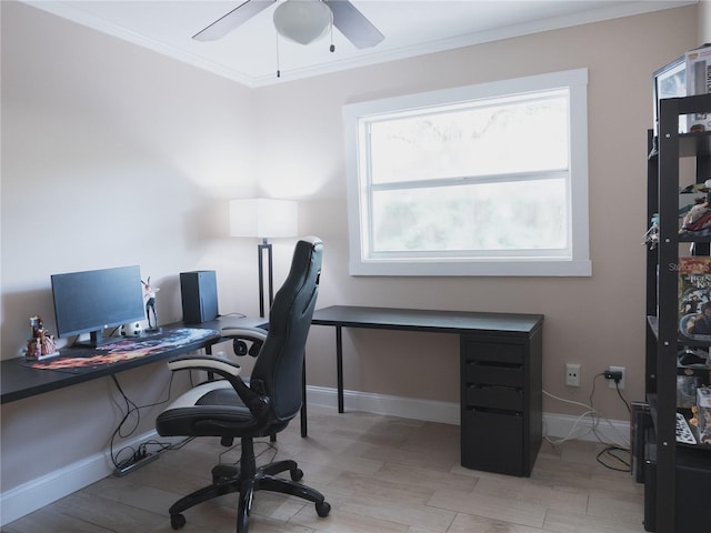 home office with crown molding, light hardwood / wood-style floors, and ceiling fan