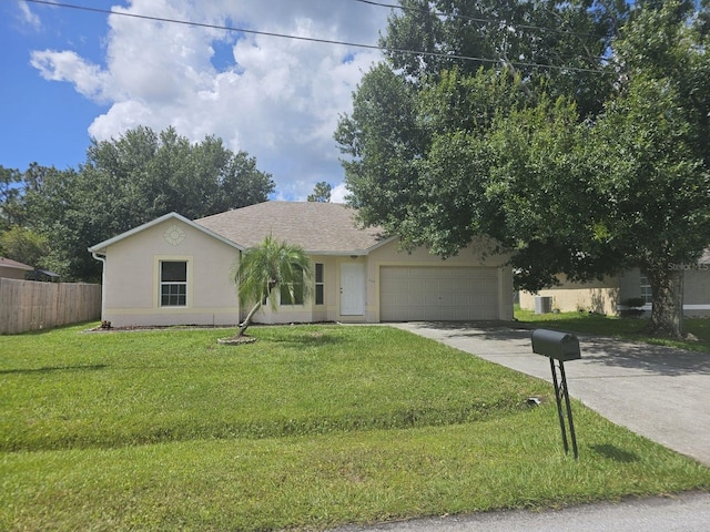 single story home with a garage and a front yard