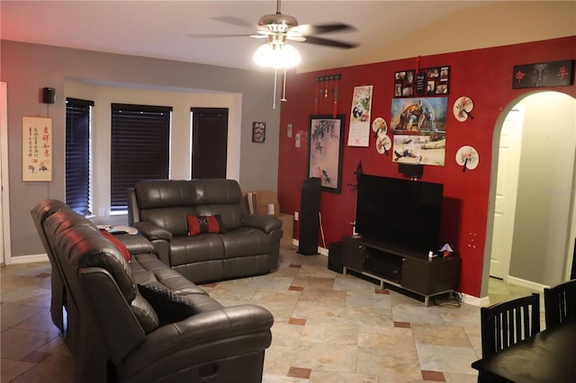 living room featuring tile patterned flooring and ceiling fan