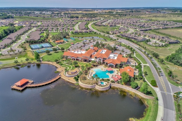 bird's eye view with a water view