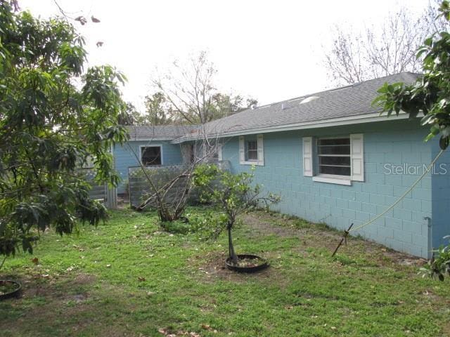 view of home's exterior featuring a lawn