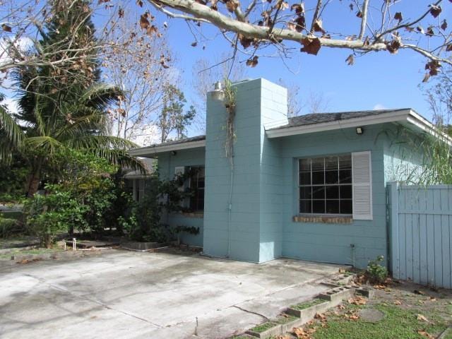 view of side of home featuring a patio