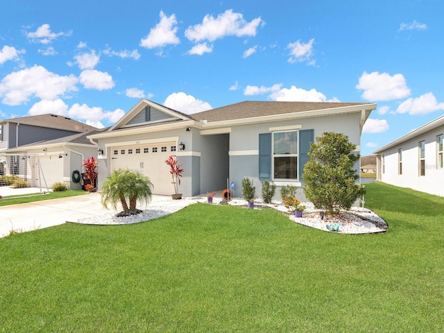 view of front facade featuring a garage and a front yard