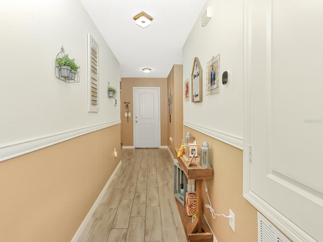 hall featuring light hardwood / wood-style flooring