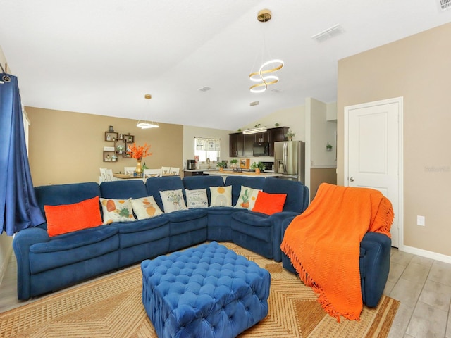 living room with vaulted ceiling