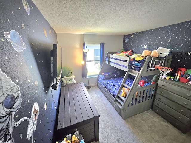 carpeted bedroom featuring a textured ceiling