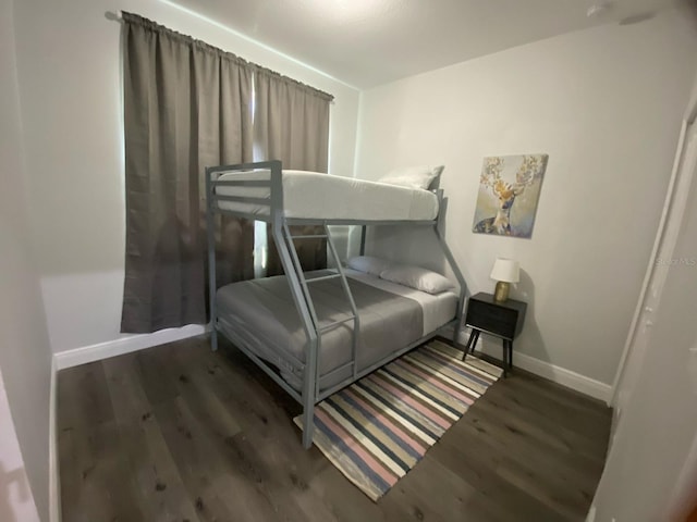 bedroom featuring dark hardwood / wood-style flooring