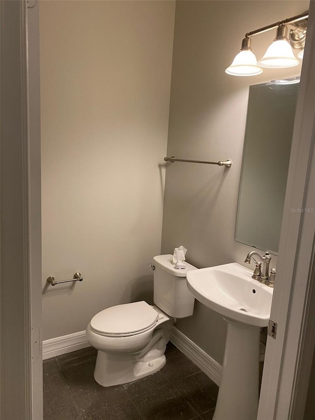 bathroom featuring toilet