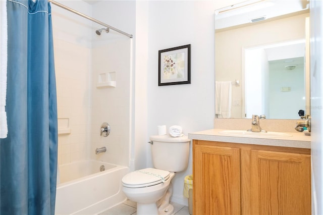 full bathroom with vanity, shower / tub combo, tile patterned floors, and toilet