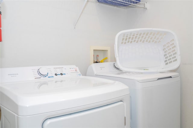 laundry area featuring washing machine and dryer