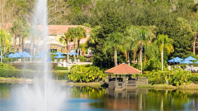 exterior space with a gazebo and a water view