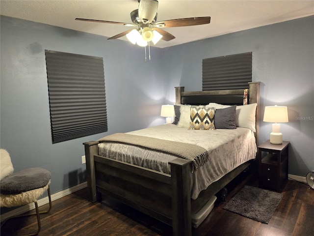 bedroom featuring hardwood / wood-style floors and ceiling fan