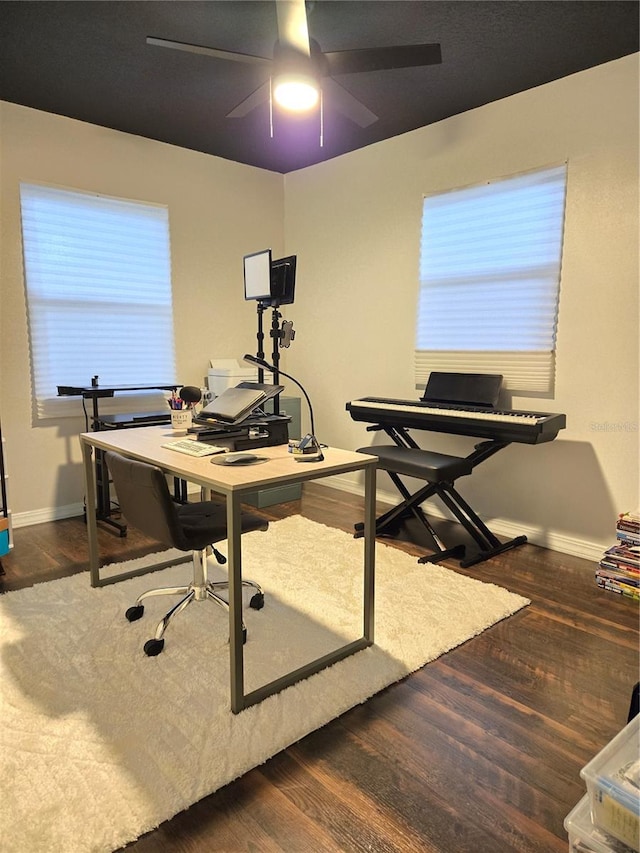 office space featuring hardwood / wood-style floors and ceiling fan