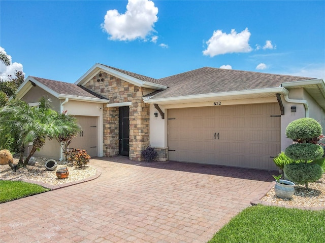 single story home with a garage