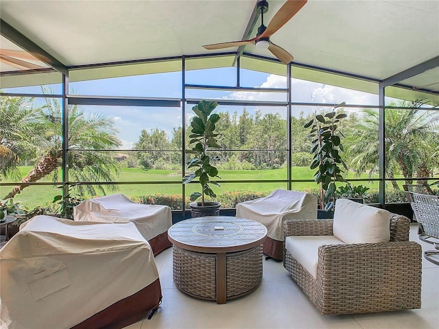 sunroom / solarium with ceiling fan