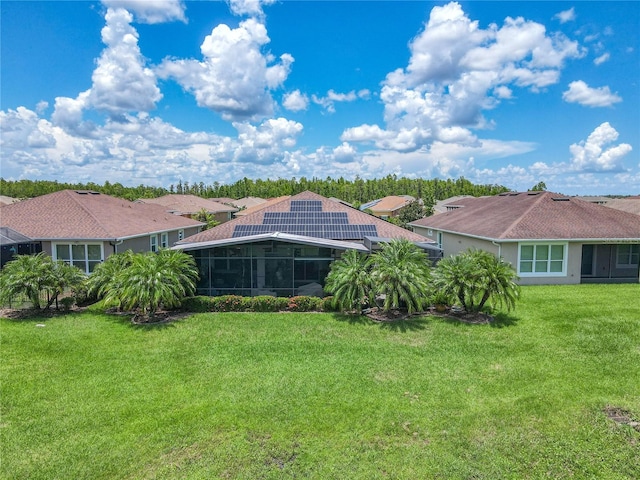 view of yard featuring a sunroom