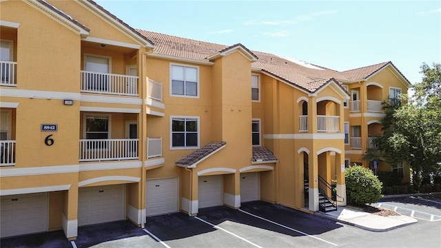 view of building exterior featuring a garage