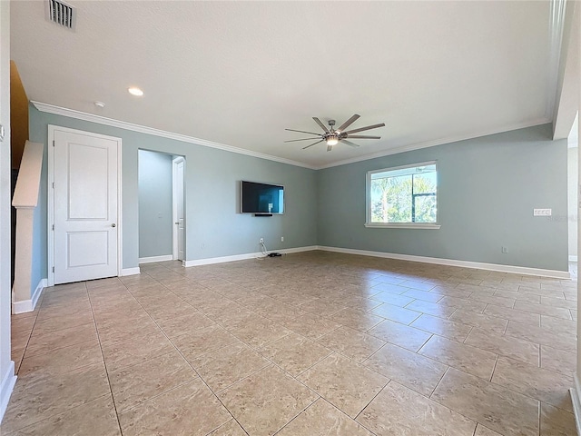 spare room featuring ceiling fan and ornamental molding