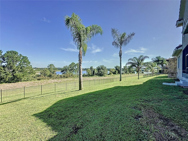 view of yard with a rural view