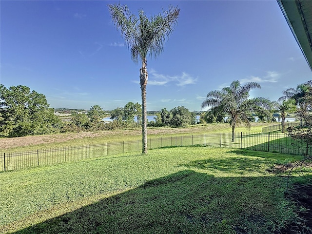 view of yard with a rural view